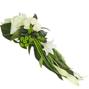 Modern funeral spray of white lilies